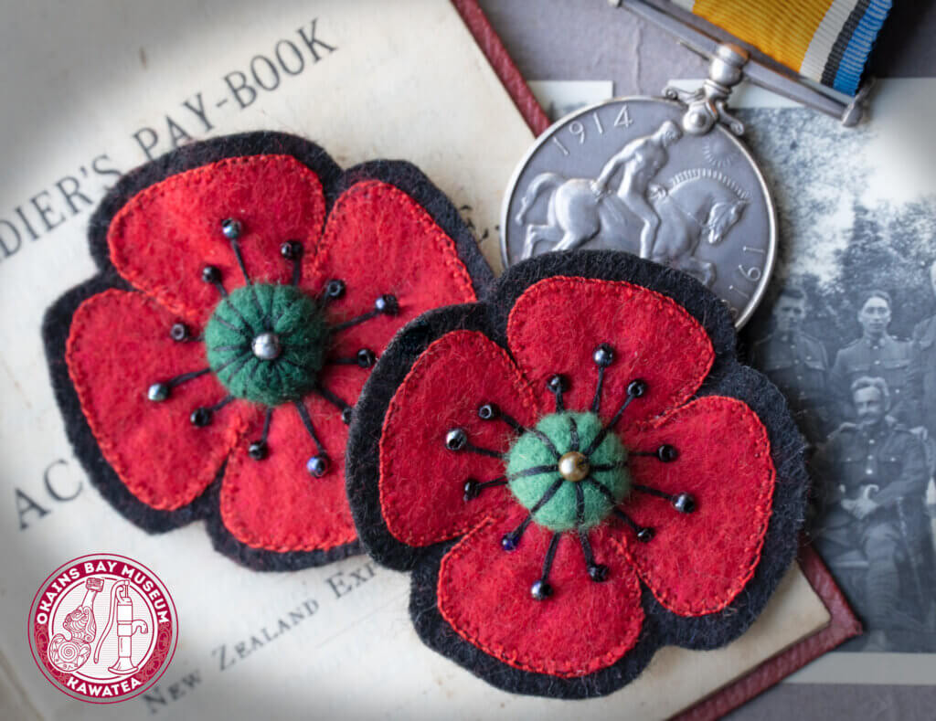 Two ANZAC Poppy brooches